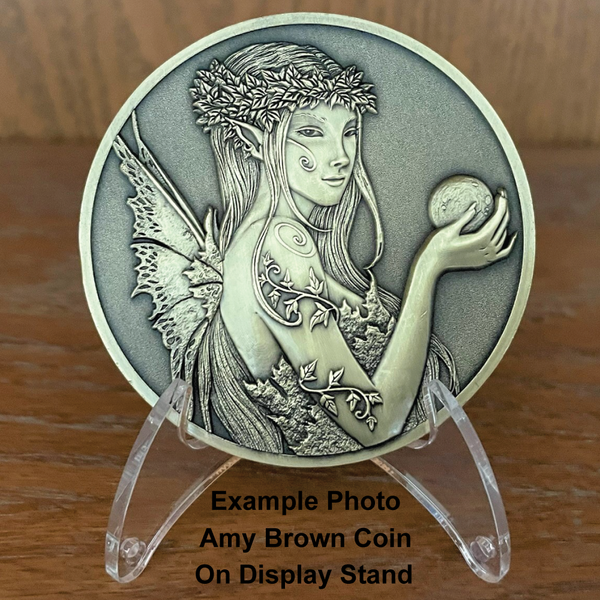 Load image into Gallery viewer, Gold metal coin with fairy on plastic display stand