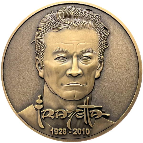 Load image into Gallery viewer, Gold metal coin showing Frank Frazetta portrait with his name and 1928-2010

