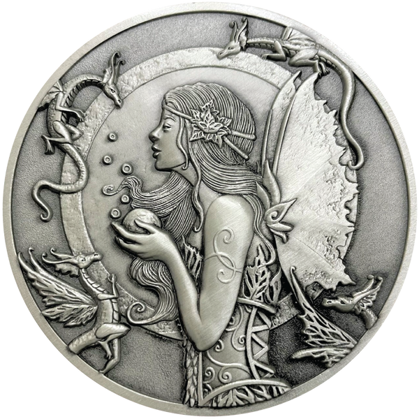 Load image into Gallery viewer, Silver metal coin showing fairy with small dragons around her