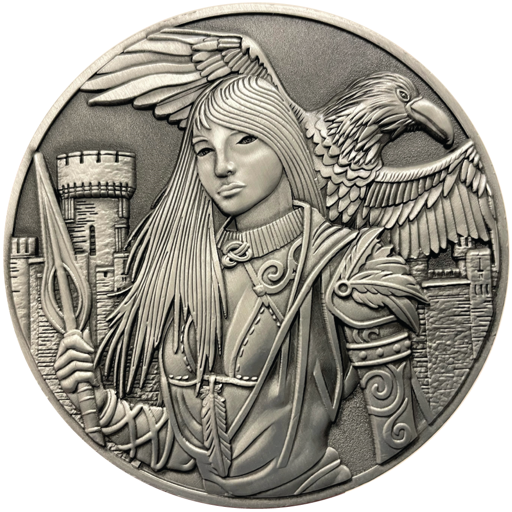 Silver metal coin showing Morrigan