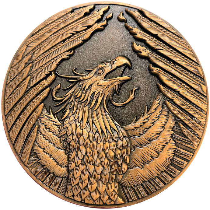 Copper metal coin showing Phoenix
