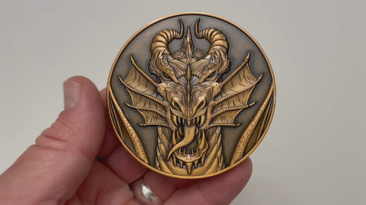 Video has no audio.  Video shows coin that is depicted on this product page, being held in hand and flipped over