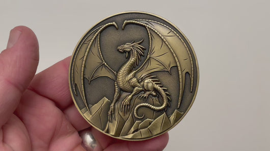 Video has no audio.  Video shows coin that is depicted on this product page, being held in hand and flipped over