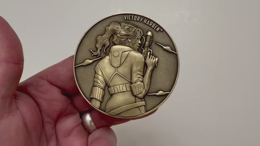 Video has no audio.  Video shows coin that is depicted on this product page, being held in hand and flipped over