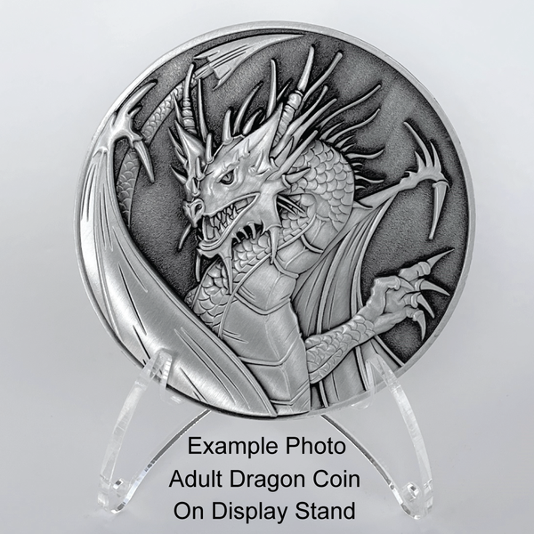 Load image into Gallery viewer, Silver metal coin, with dragon image, on plastic stand
