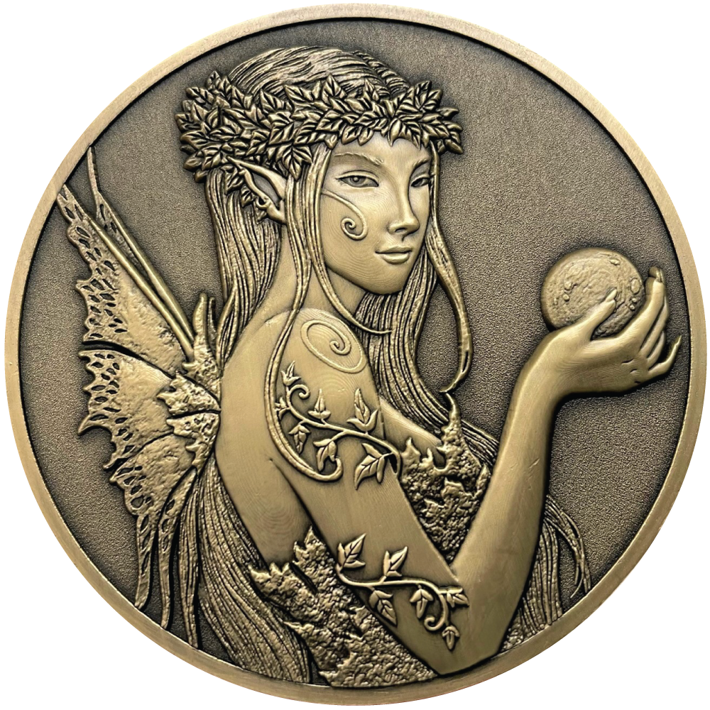 Gold metal coins showing fairy with ball in hand
