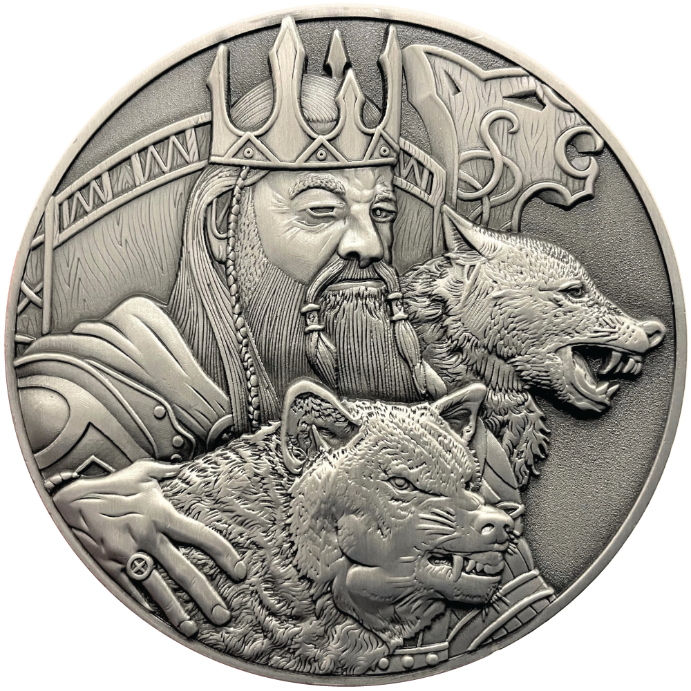 Silver metal coin showing Odin and wolves