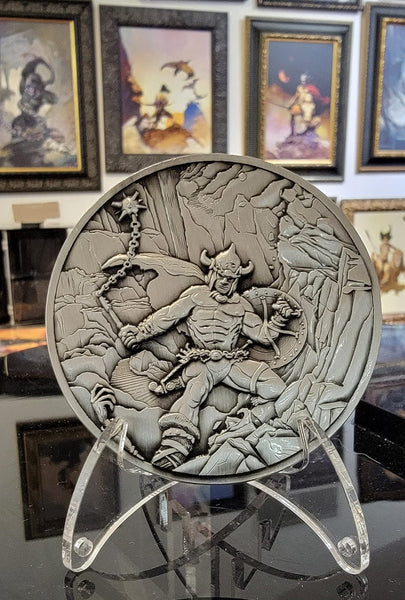 Load image into Gallery viewer, Warrior with Ball &amp; Chain on stand at Frazetta museum
