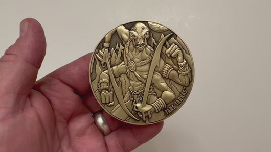 Video has no audio.  Video shows coin that is depicted on this product page, being held in hand and flipped over