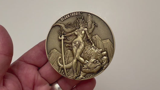 Video has no audio.  Video shows coin that is depicted on this product page, being held in hand and flipped over