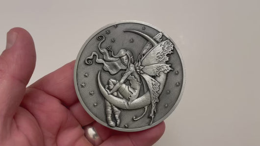 Video has no audio.  Video shows coin that is depicted on this product page, being held in hand and flipped over